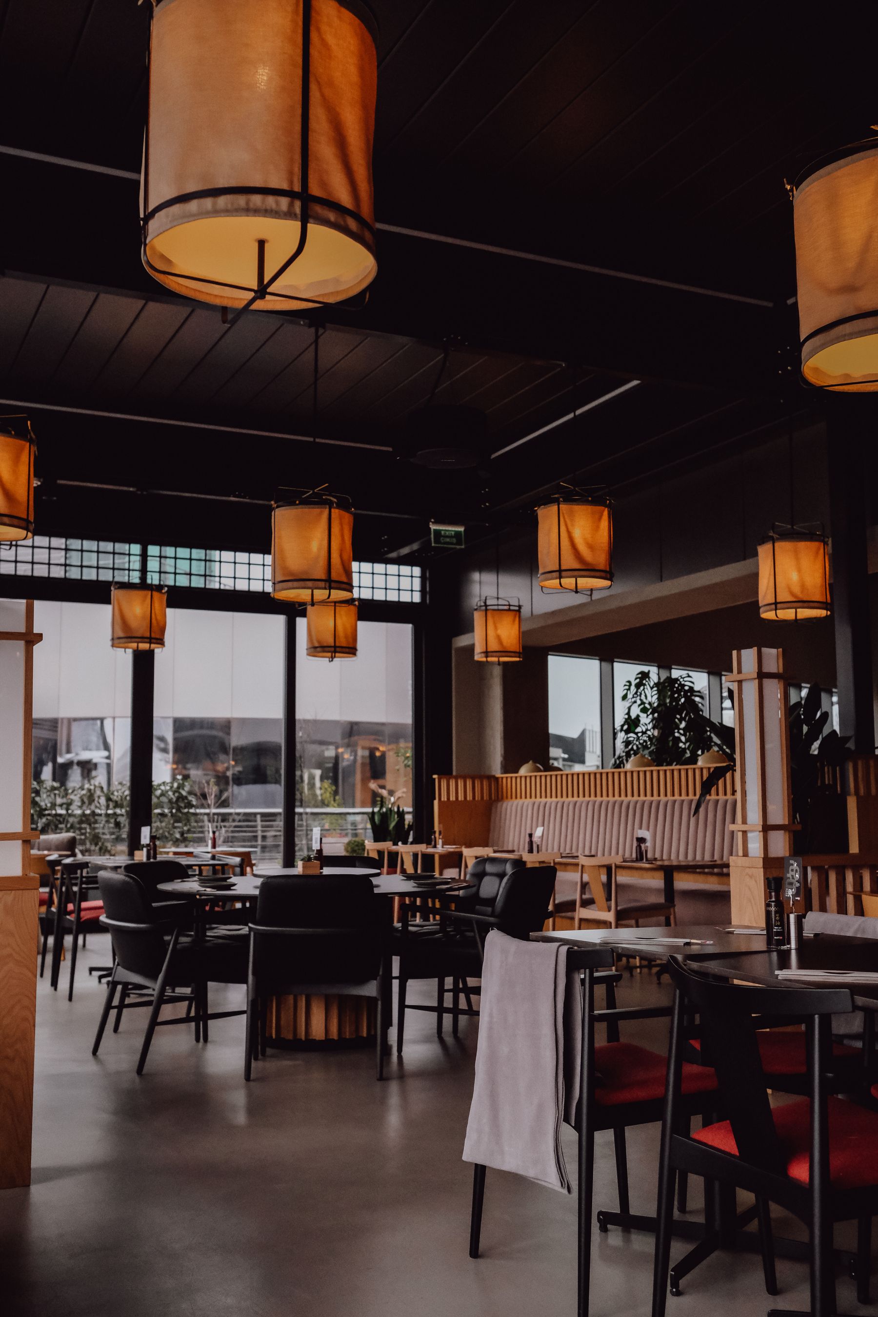 Warm modern restaurant interior prepared for diners